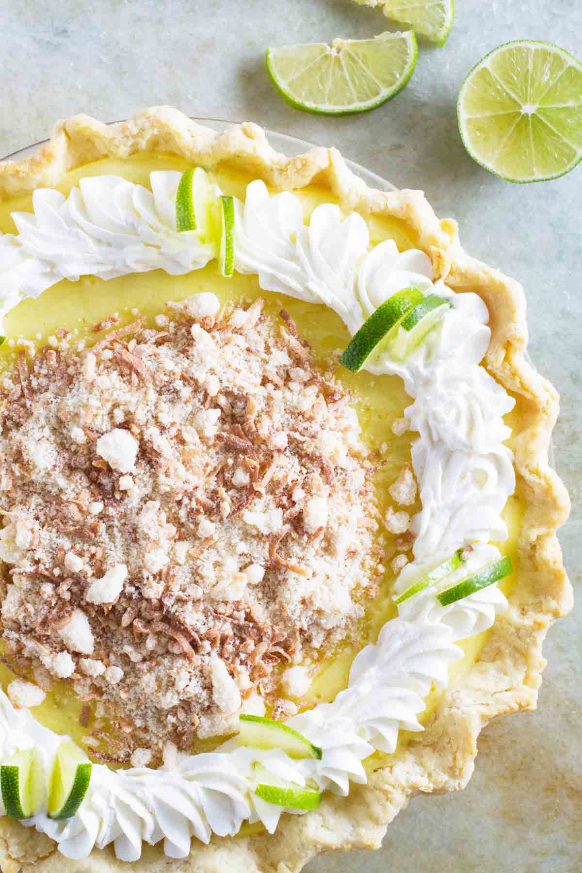 Full Caribbean Truffle Pie topped with toasted coconut and whipped cream.