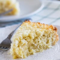 Slice of Coconut Custard Pie on a plate.