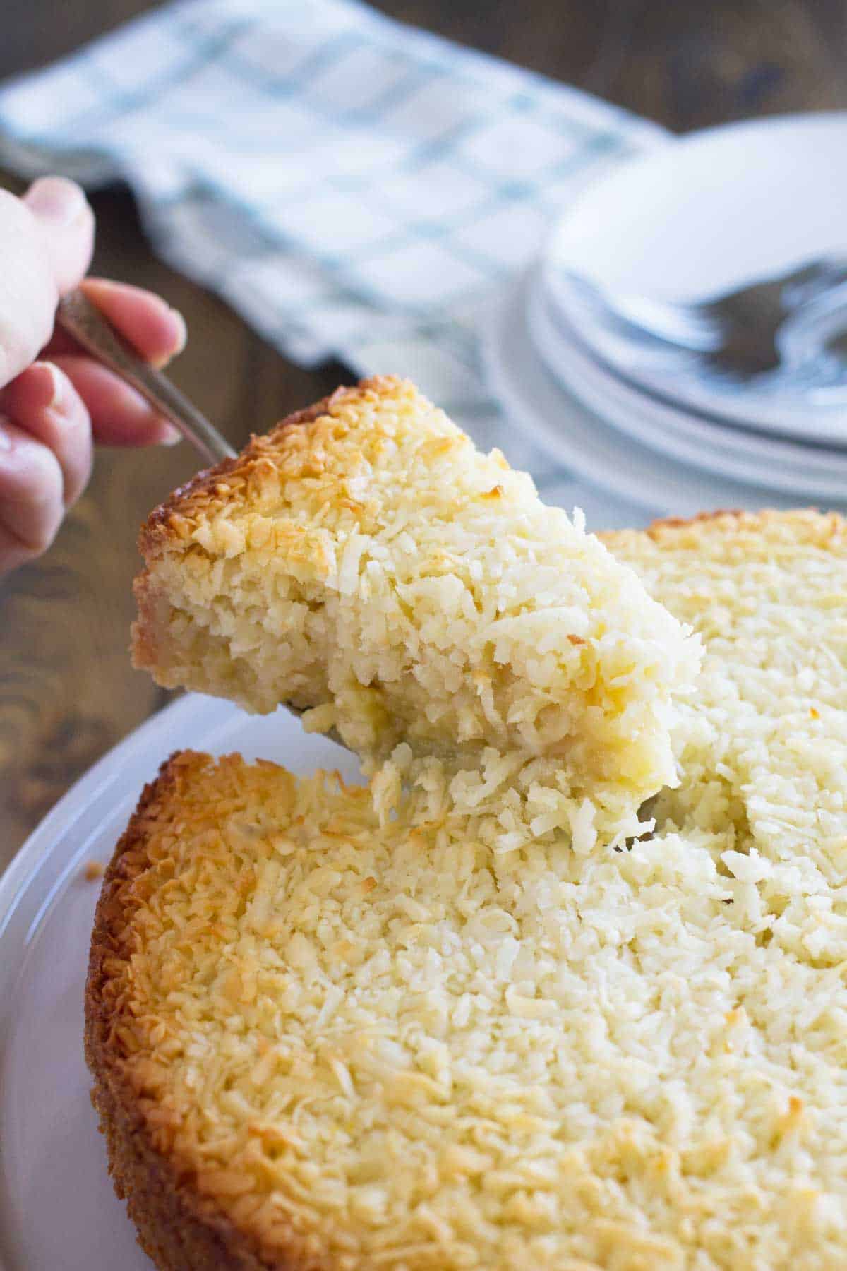 Taking out a slice of Coconut Custard Pie.