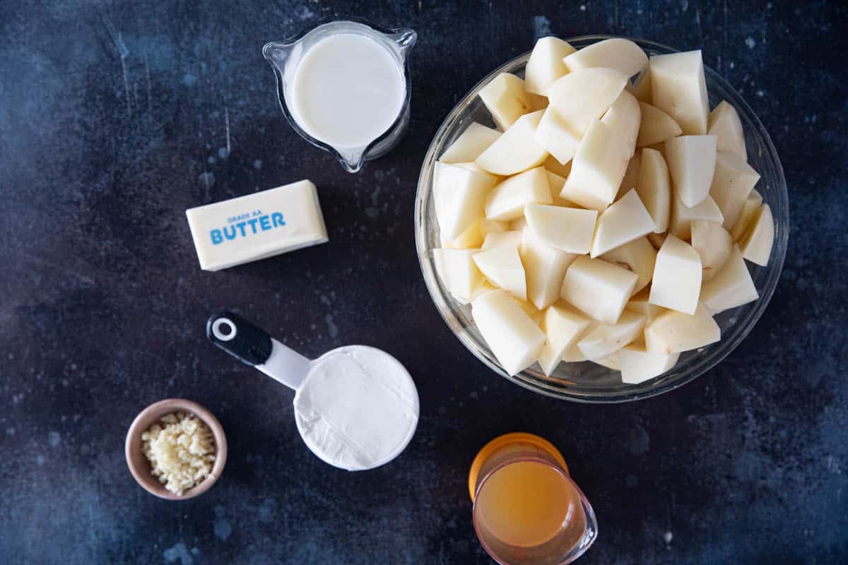 Ingredients to make crockpot mashed potatoes.