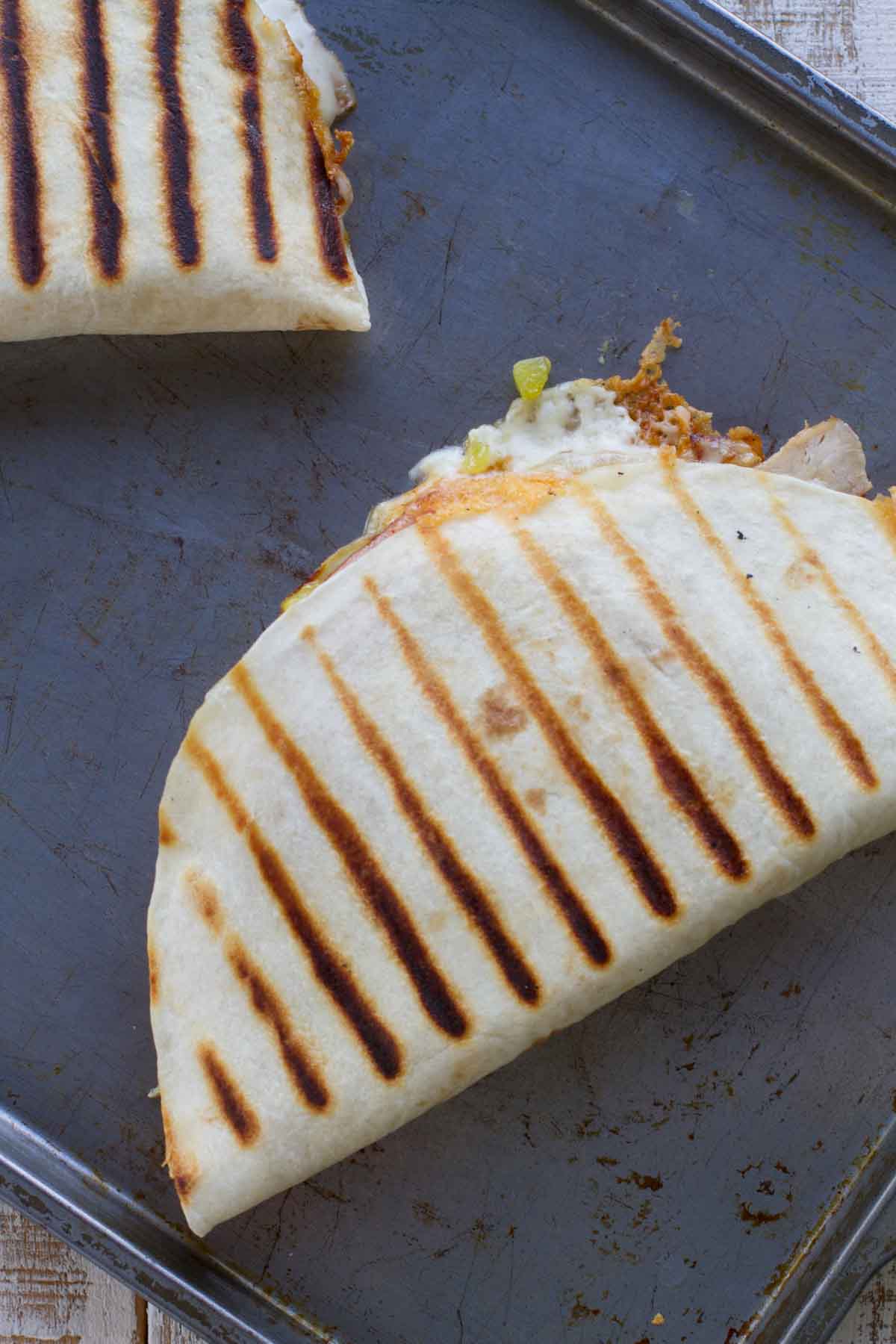 Grilled Cuban Quesadillas on a baking sheet.