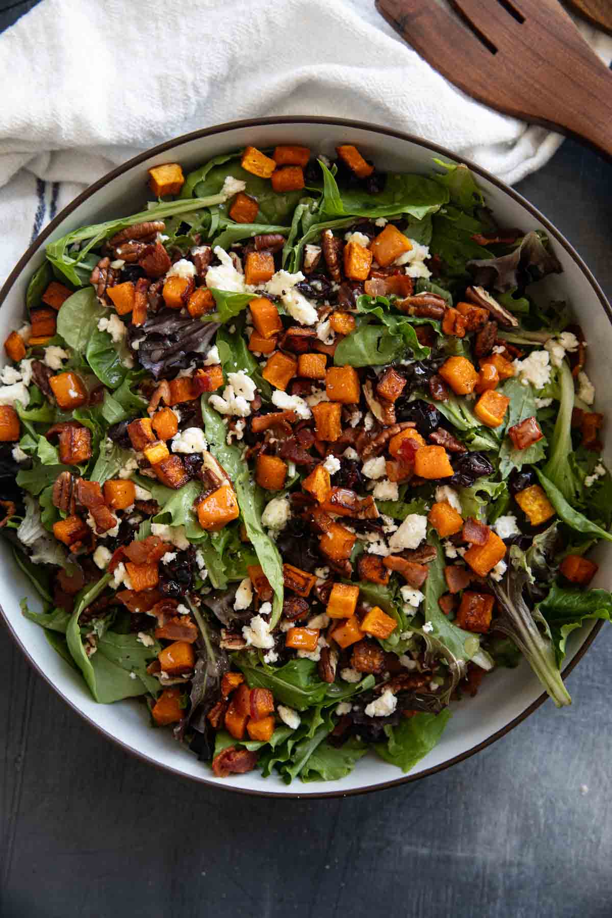 Fall Harvest Salad with roasted butternut squash and apple cider vinegar vinaigrette.