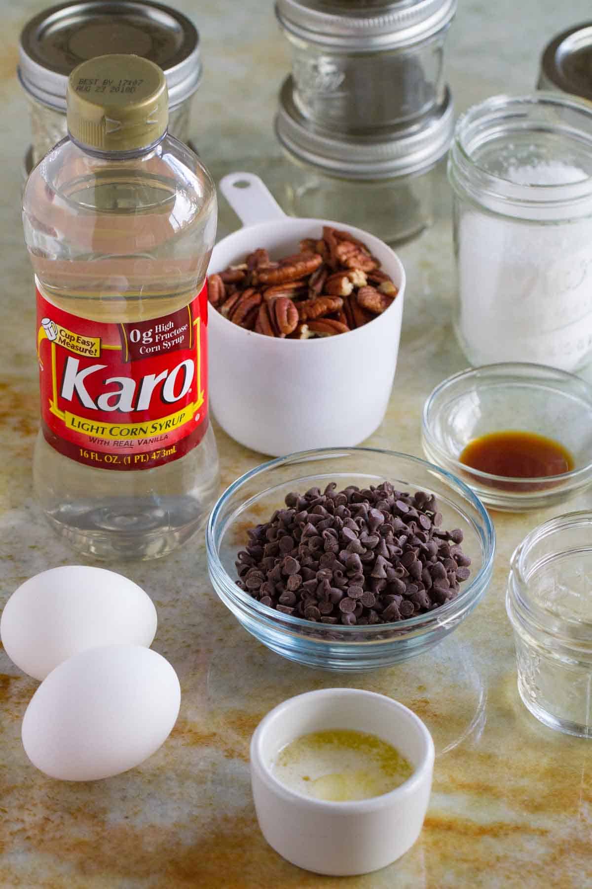 Ingredients for Mini Chocolate Pecan Pie in a Jar.