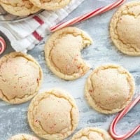 Peppermint snickerdoodles with a bite taken from one.