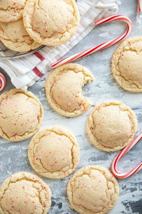 Peppermint snickerdoodles with a bite taken from one.