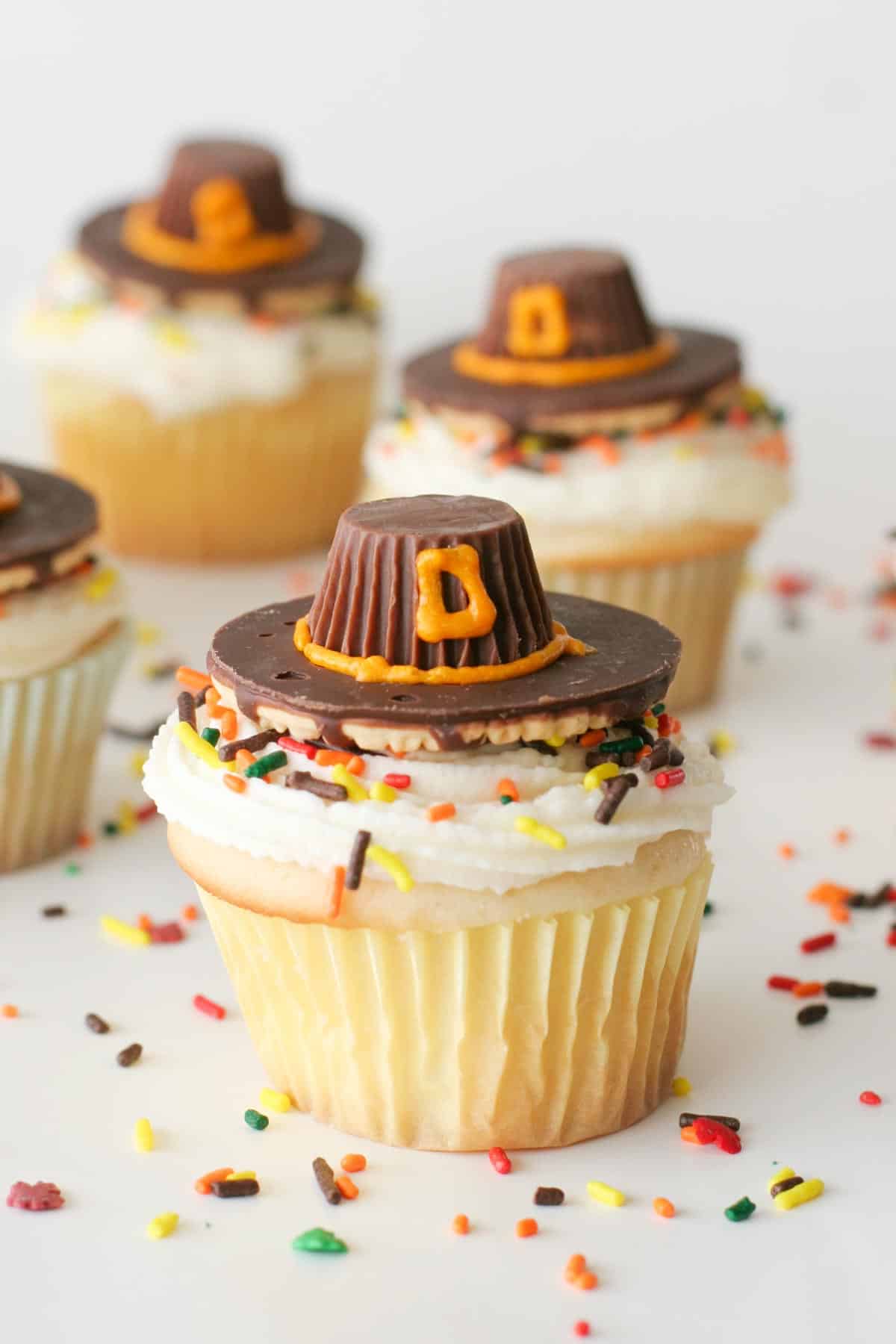 Pilgrim Hat Thanksgiving Cupcakes made from cookies and candy.