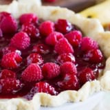 Raspberry Banana Pie - banana cream pie topped with raspberry sauce and fresh raspberries.