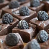 Squares of Oreo Fudge topped with mini Oreo cookies.