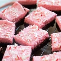 Peppermint Brownies cut into bars on a cooling rack.