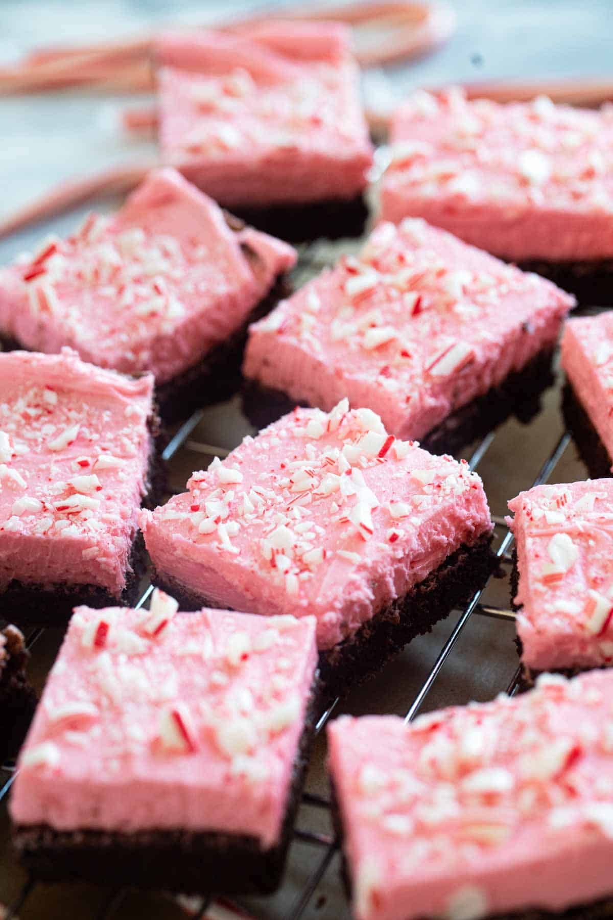 Peppermint Brownies cut into bars on a cooling rack.