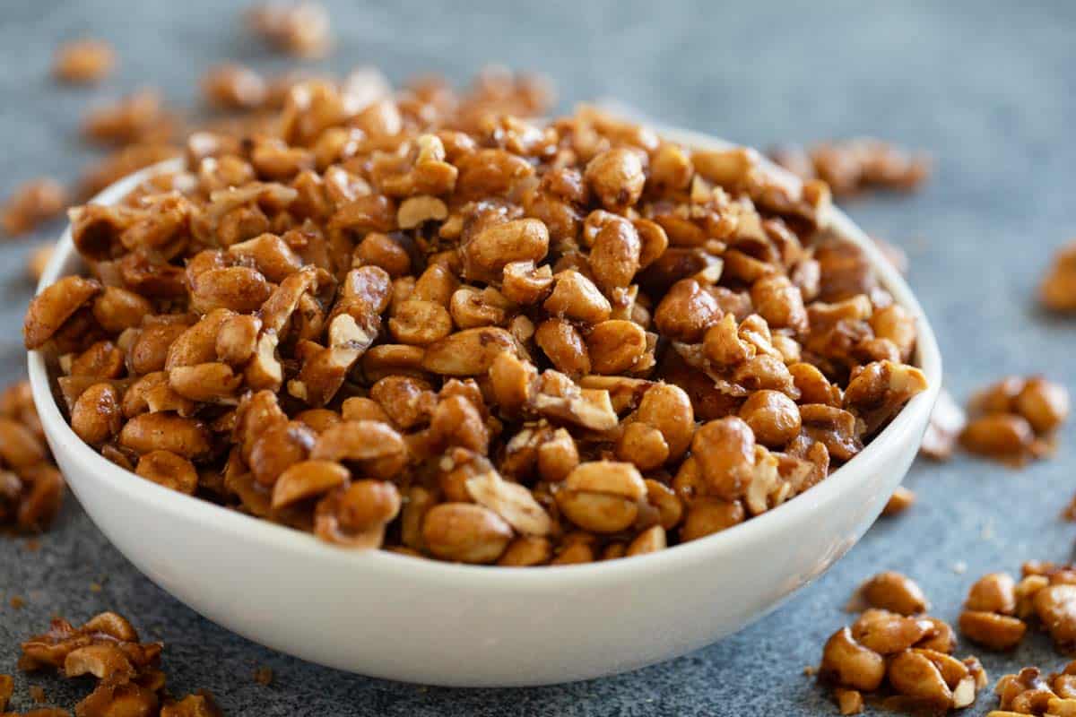 Bowl filled with homemade Toffee Peanuts.