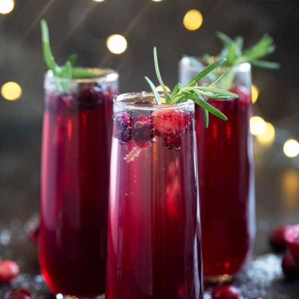 Three glasses of Virgin Pomegranate and Cranberry Bellini.