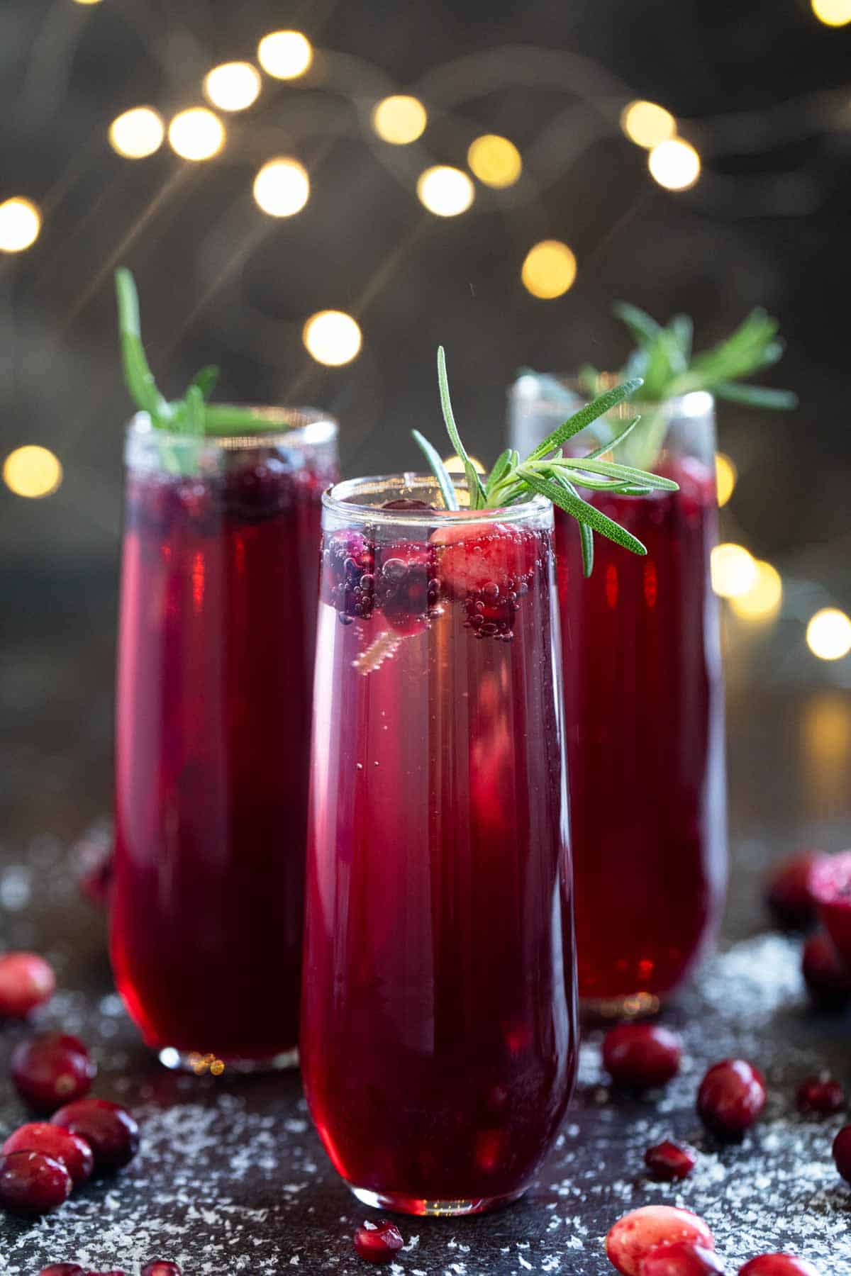 Three glasses of Virgin Pomegranate and Cranberry Bellini.