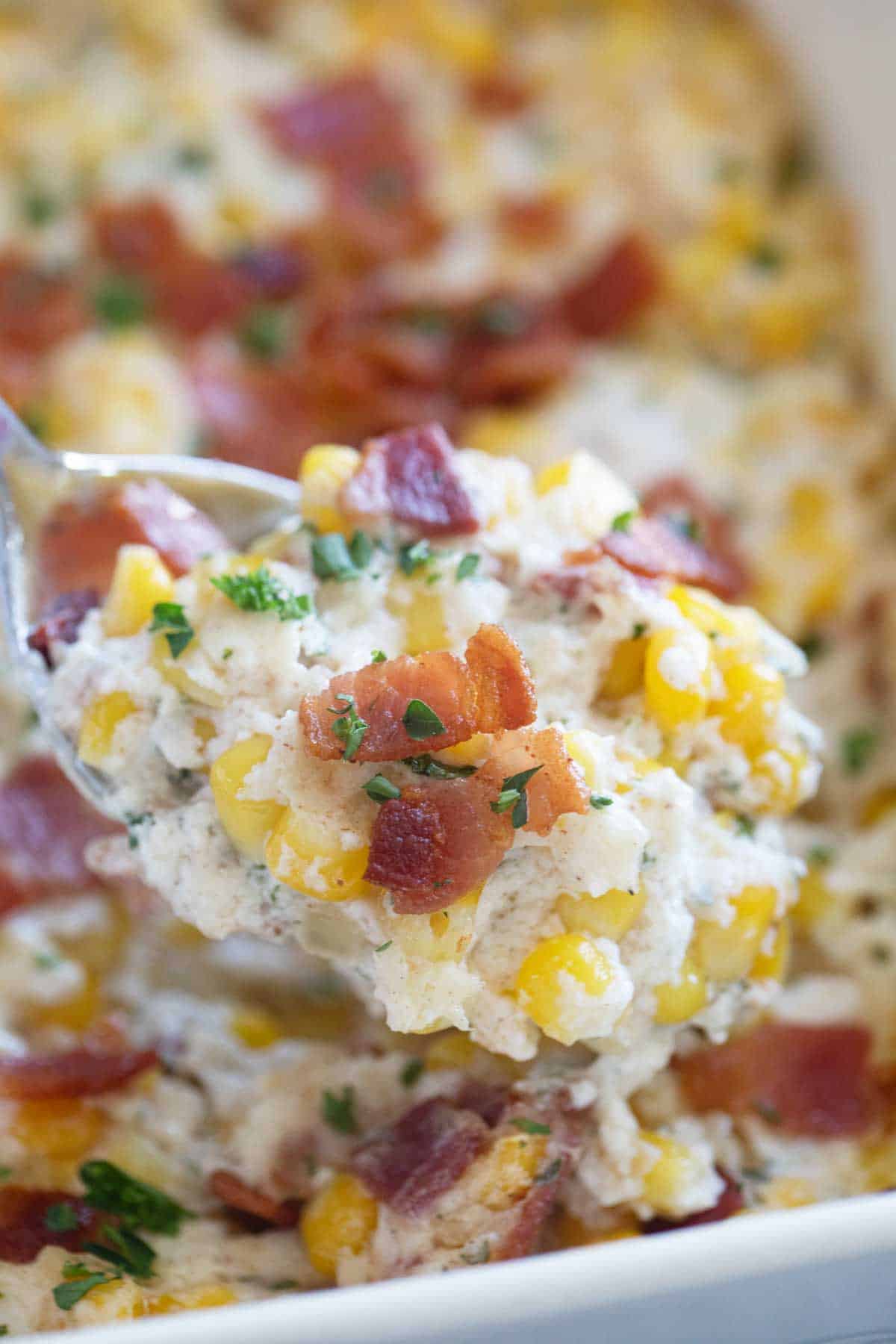 Spoon full of Creamy Corn and Bacon.