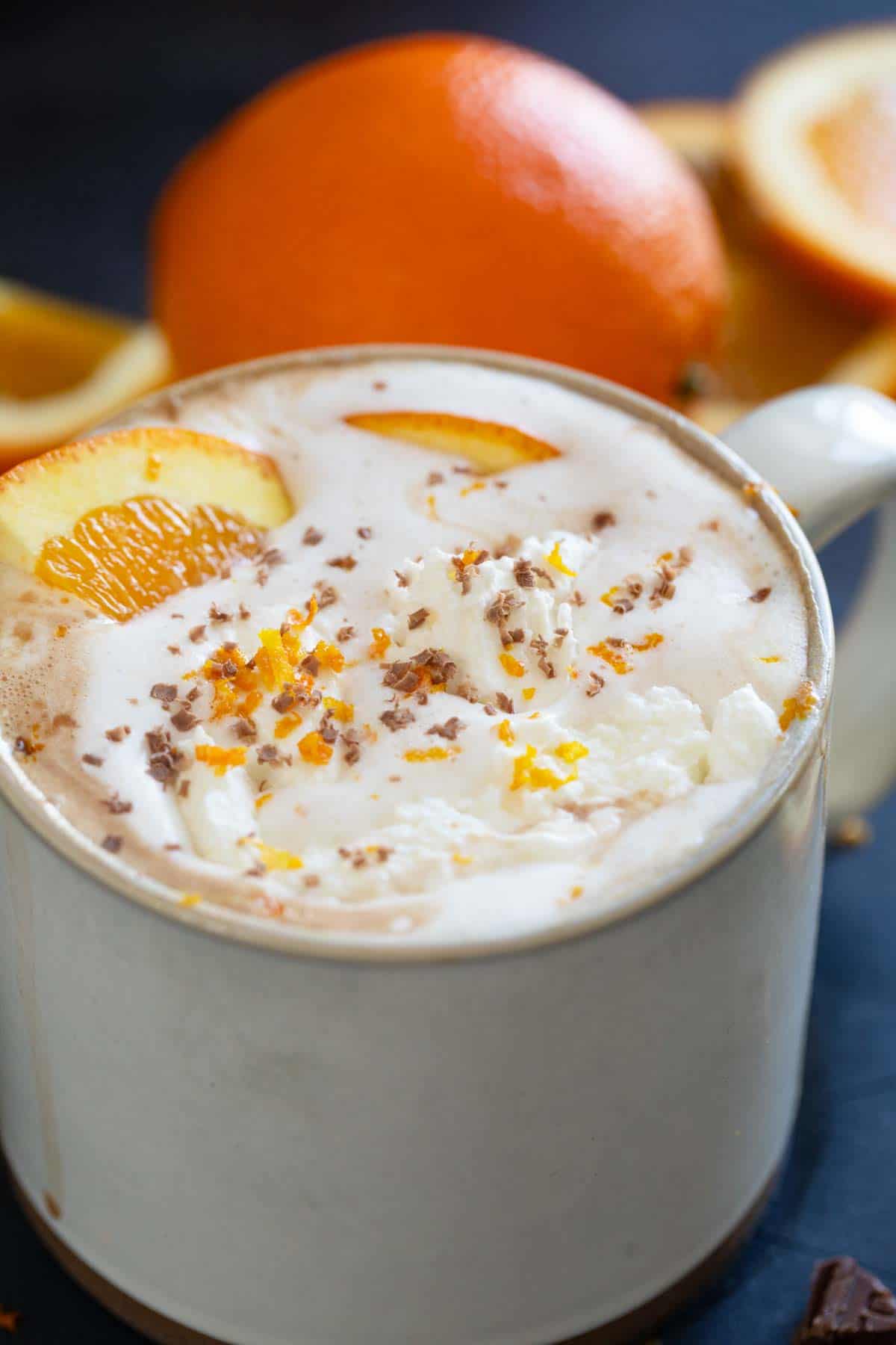 Orange hot chocolate made with milk, chocolate, orange zest, and orange juice.