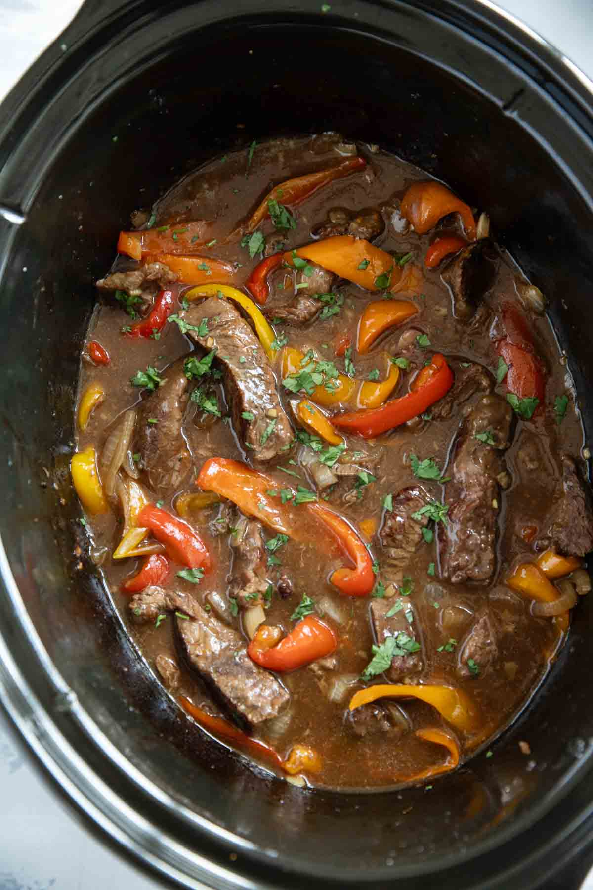 Slow Cooker Pepper Steak in a slow cooker.