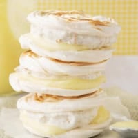 Lemon Meringue Hand Pies with graham cracker ice cream and lemon curd with meringue cookies.