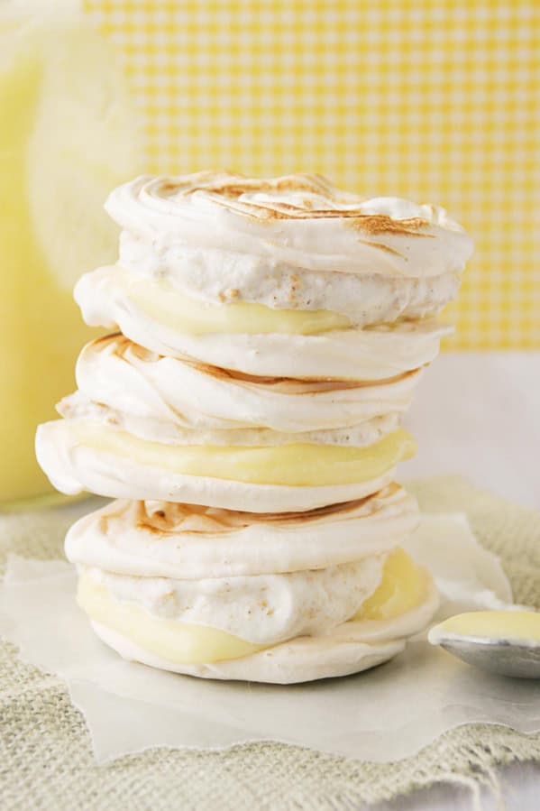 Lemon Meringue Hand Pies with graham cracker ice cream and lemon curd with meringue cookies.