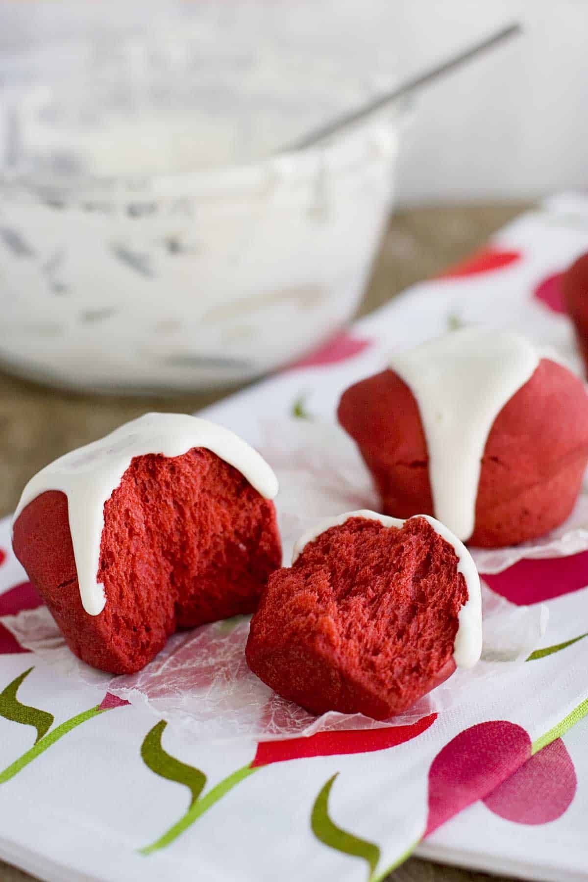 Red Velvet Roll torn in half to show texture.