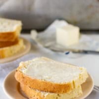 Two slices of Green Chile Cheddar Bread on a plate.